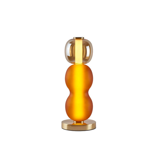 Gläserne Tischleuchte mit goldenem Sockel