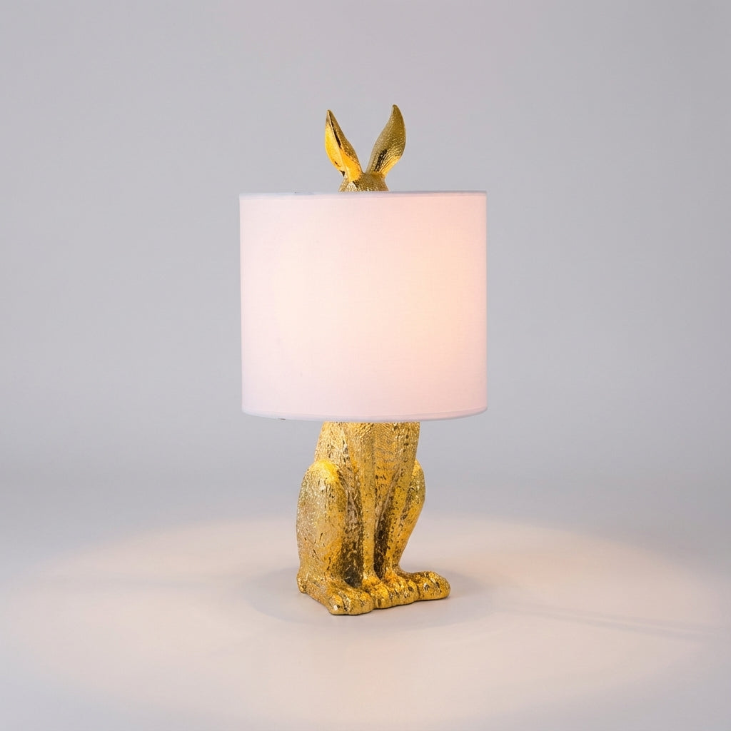Tafellampe Hase in Gold mit Leinenschirm