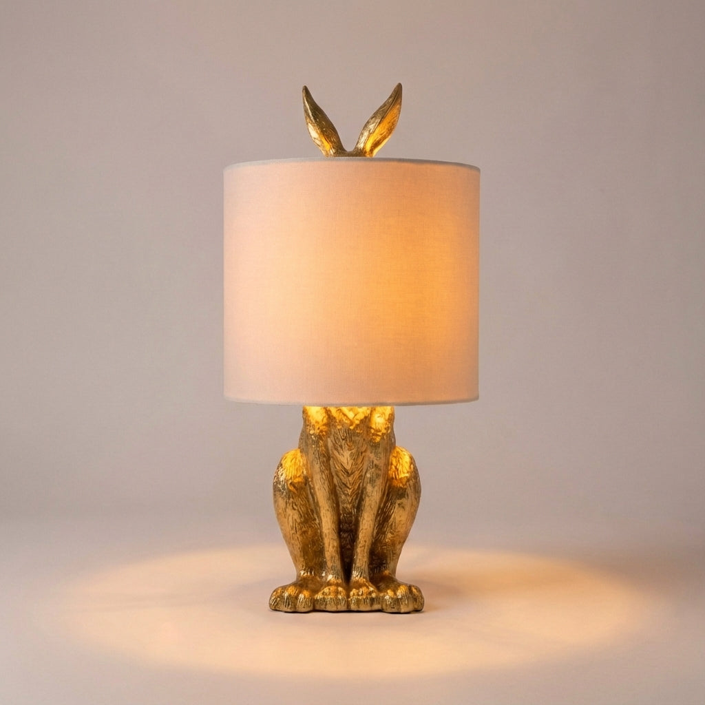 Tafellampe Hase in Gold mit Leinenschirm