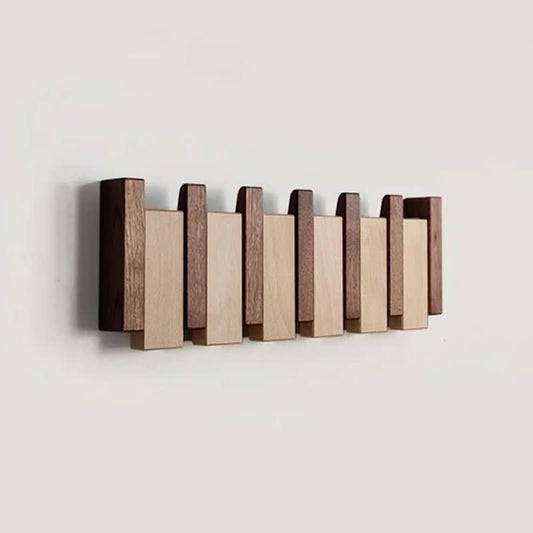 Handgemachte Wandgarderobe aus Holz mit Klapphaken