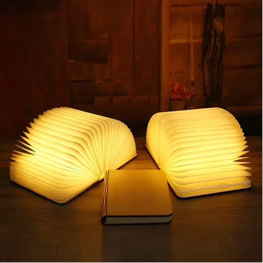 Faltbare LED-Buchlampe aus Holz mit warmem Licht